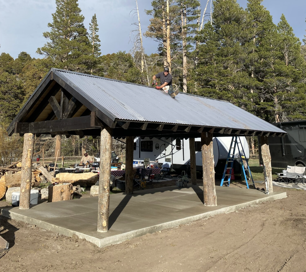 Tobin Construction team building a covered outdoor structure